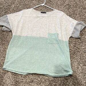 Pink Clover XXL women’s short sleeve knit top. From StitchFix. Has pocket